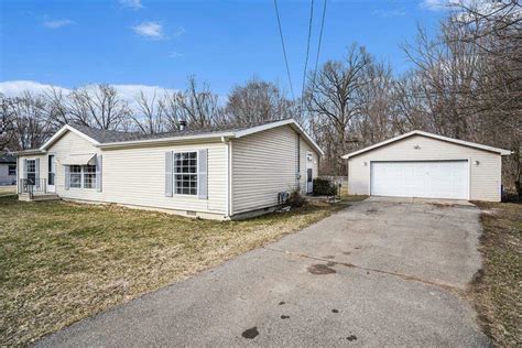 cheap homes in the comstock area mi